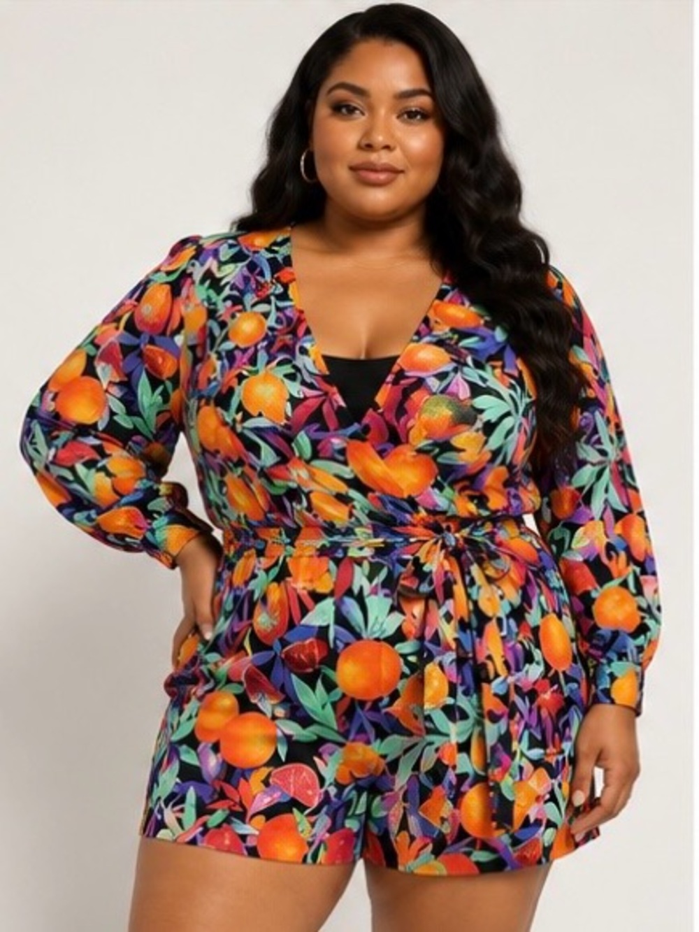 Vibrant Orange and Blue Jumpsuit with Bold Tropical Print